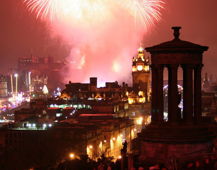 New Year fireworks above Edinburgh, with the castle and city skyline visible