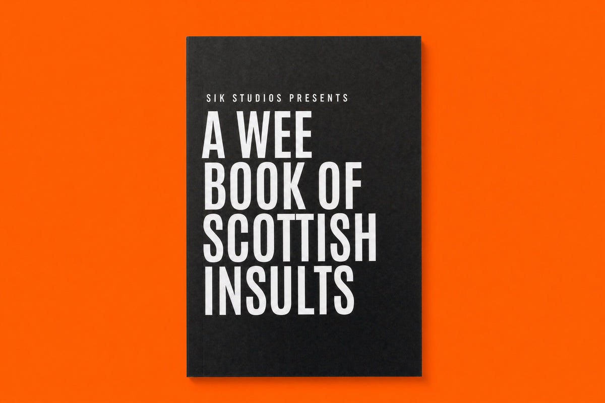 A Wee Book of Scottish Insults, black A6 cover, on Sik Studios orange